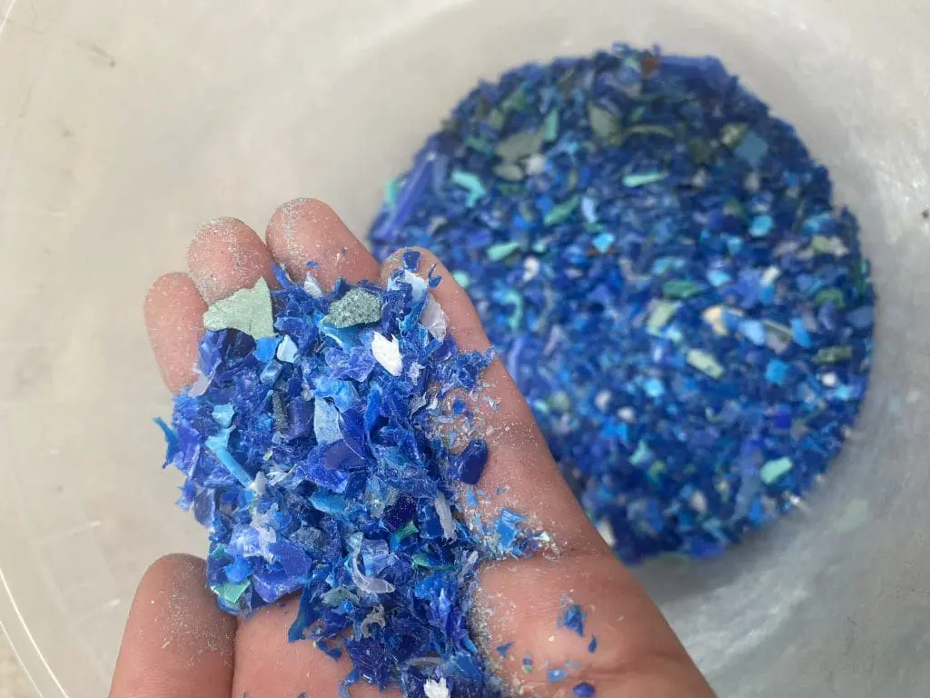 Blue Marine Debris Collected by Eco Barge and Shredded